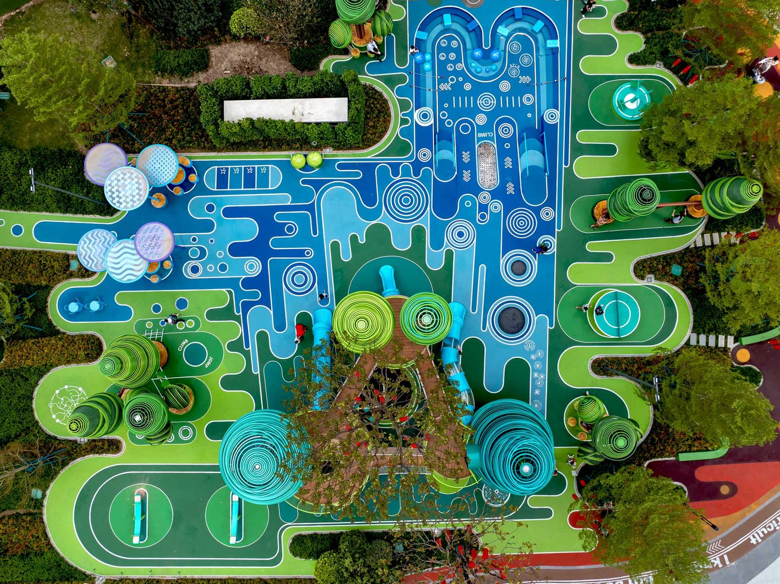 Aerial view showing the full extent of the playscape and its surrounding gardens.